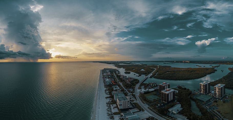 Building Near Body of Water, architecture, bay, beach, city, clouds HD wallpaper