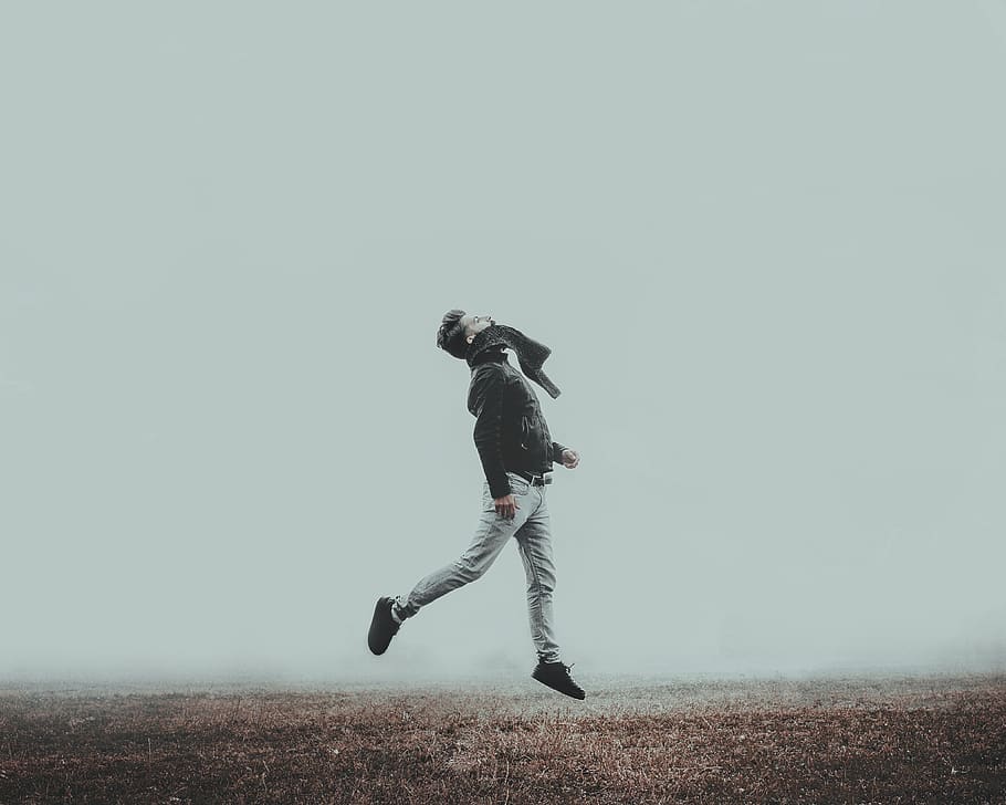 man jumping during daytime, human, person, dirt road, gravel HD wallpaper