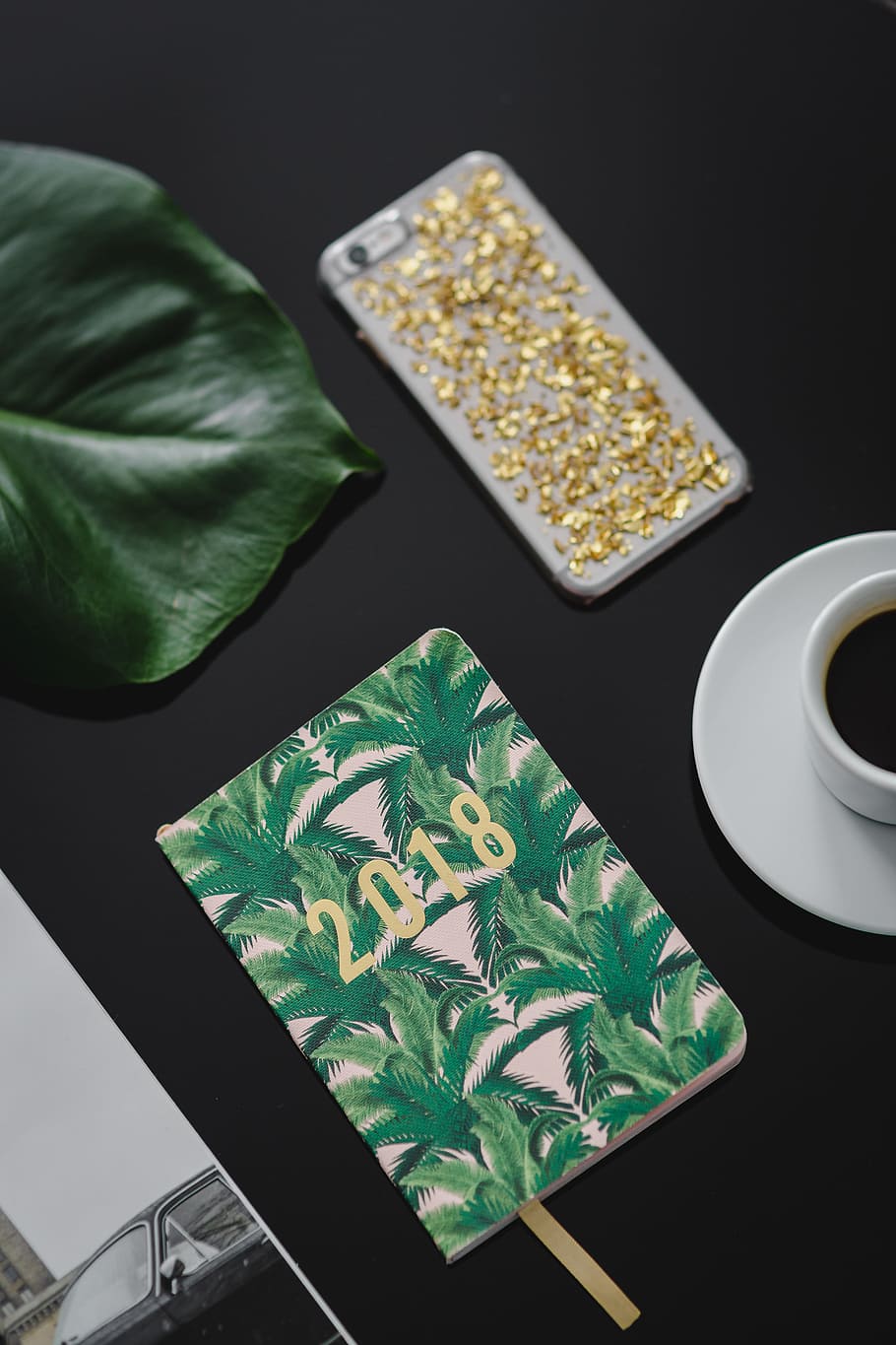 Top view of black table with 2018 calendar agenda, food and drink HD wallpaper