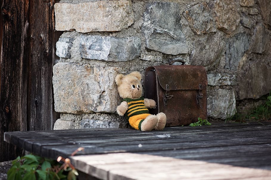 Brown Bear Plush Toy Leaning on Brown Concrete Wall, abandoned HD wallpaper