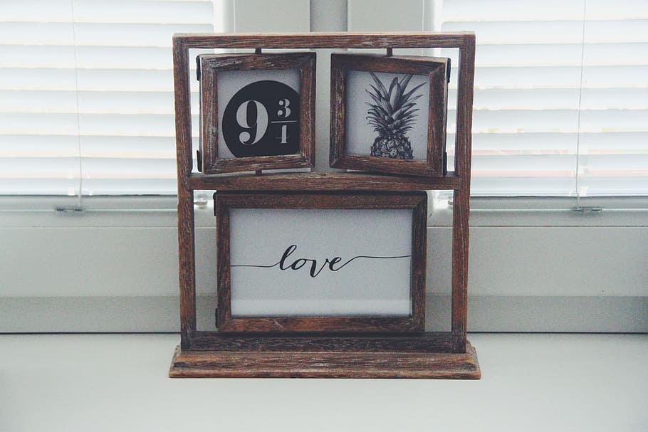 Brown Wooden Picture Frames Beside Window, colors, decoration