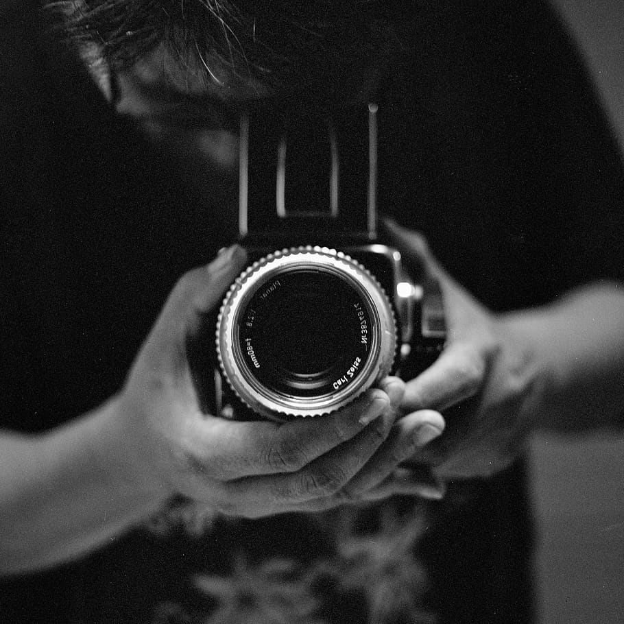 holding, human hand, focus on foreground, camera - photographic equipment HD wallpaper