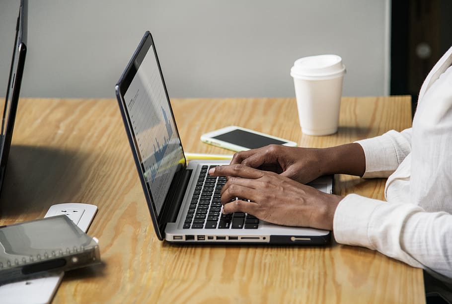 Person Wearing White Long-sleeved Top Using Laptop Computer, coffee HD wallpaper