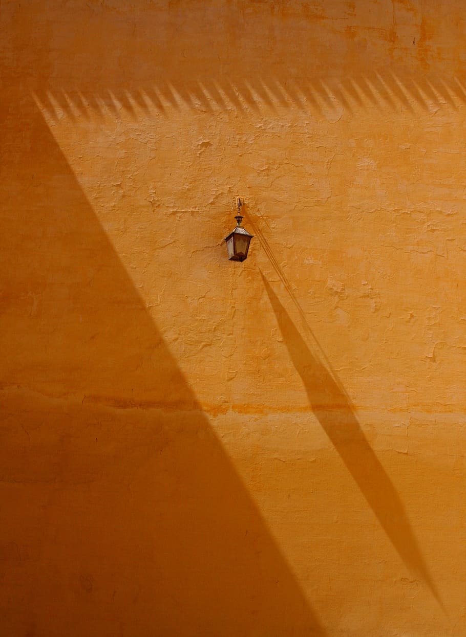black outdoor sconce on wall, light, lamp, orange, shadow, yellow HD wallpaper