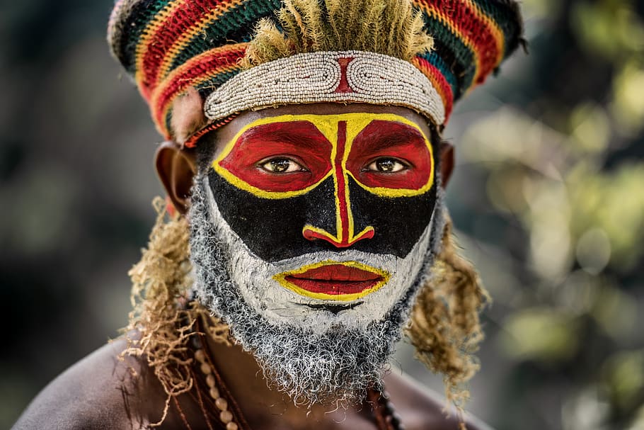 man with paint on face, person, mask, face paint, beard, indigenous