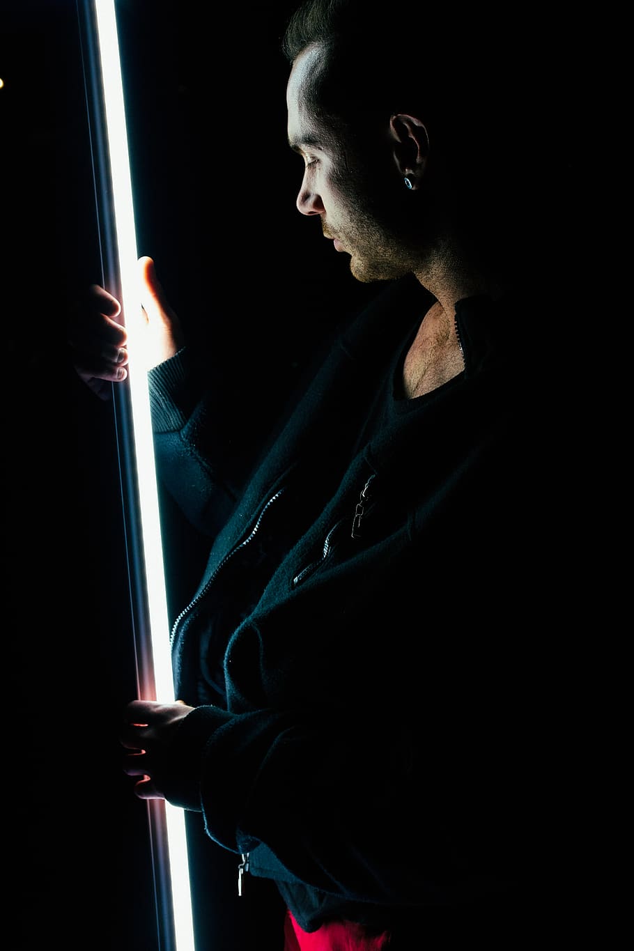 man holding whiyte light, person, human, duel, apparel, clothing HD wallpaper