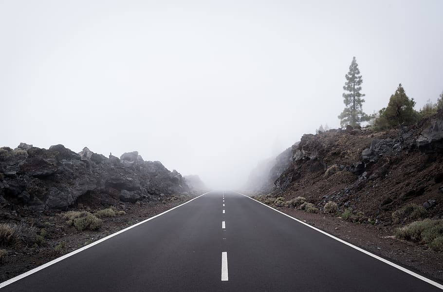 gray roads between mountains, way, highway, asphalt, tarmac, fog HD wallpaper
