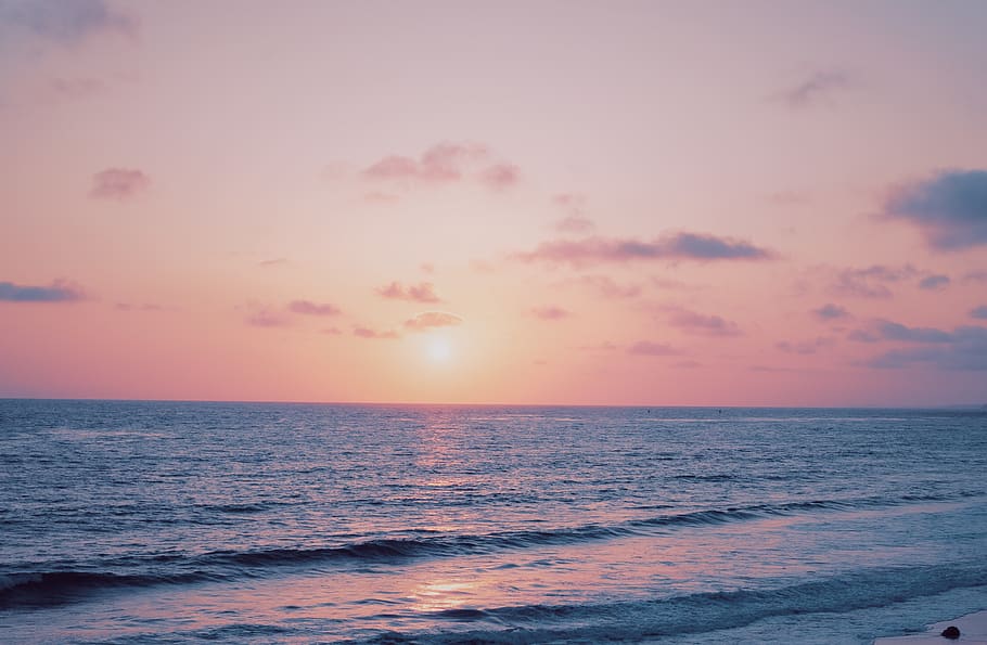 orange sunset sky over the beach, sea, water, horizon over water HD wallpaper