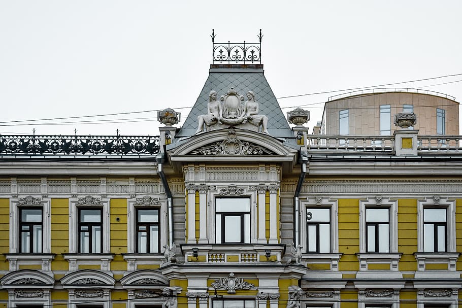 gray and yellow concrete building during daytime, architecture