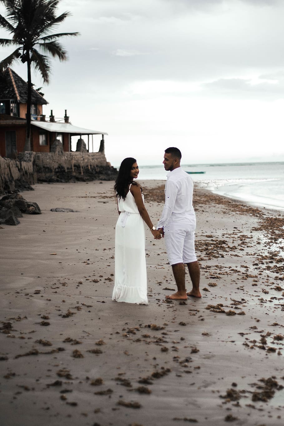 Couple Standing on Shore, beach, daylight, daytime, female, holding hands HD wallpaper
