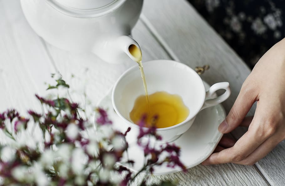 Person Pouring Tea On Teacup, beverage, break, drink, hand, herbal, HD wallpaper