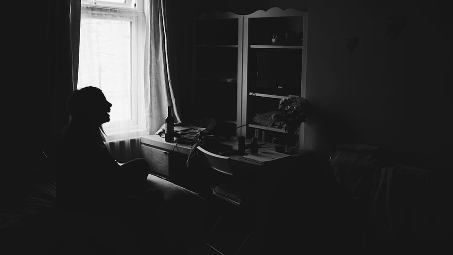 Person Laughing in Living Room, adult, backlit, chair, dark, emotion