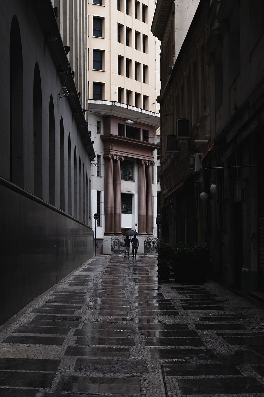 Man Walking Between Buildings, architecture, city, colors, daylight HD wallpaper