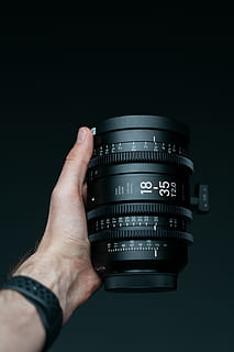 person holding camera lens, human, electronics, display, computer HD wallpaper