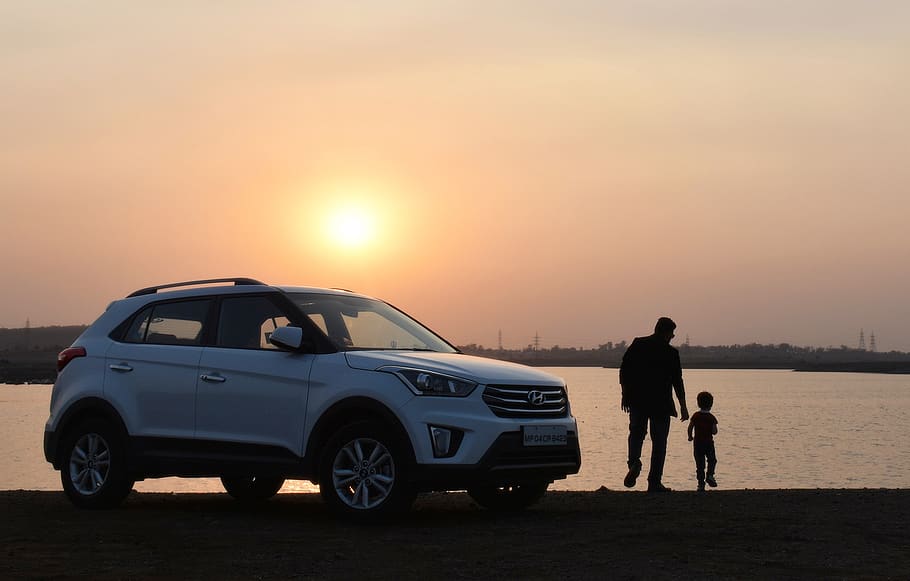 Silhouette of Man and Child Near White Hyundai Tucson Suv during Golden Hour, HD wallpaper