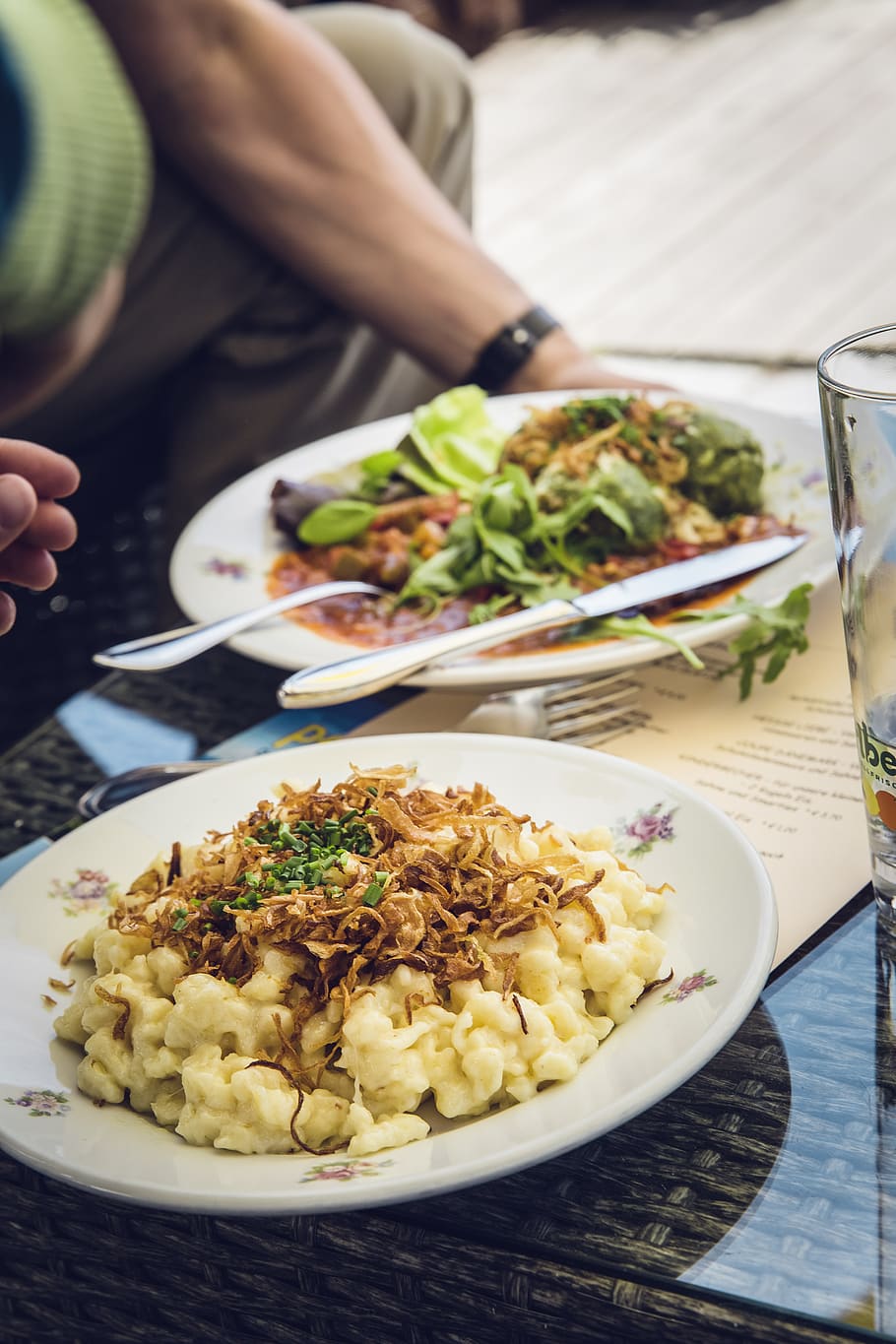 Cooked Pasta on White Ceramic Round Beside Vegetable Salad With Sauce HD wallpaper