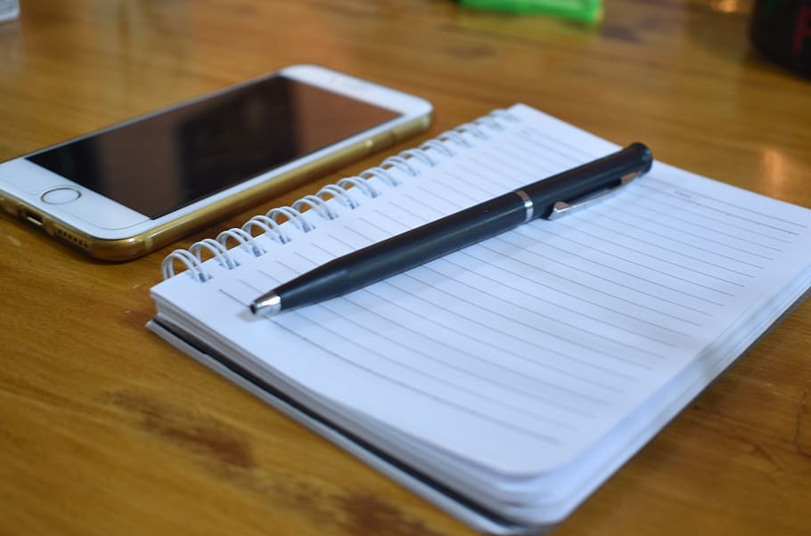 notebook, pen, writing, iphone, business, table, wireless technology HD wallpaper