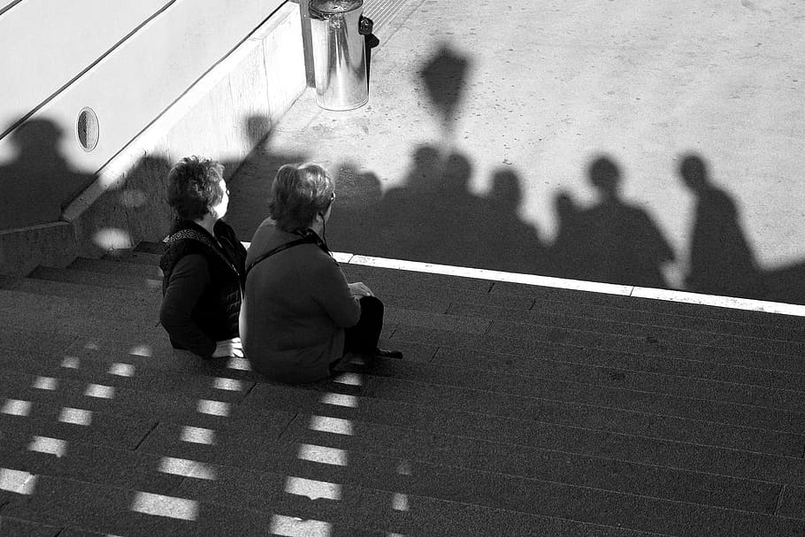 two persons sitting on stairs, human, pedestrian, tarmac, asphalt HD wallpaper