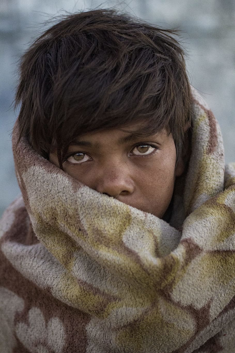 cold, person, eyes, face, blanket, blurred background, boy, child