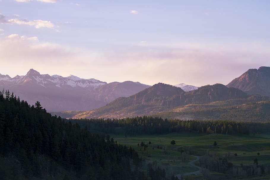 green grass valley between brown hills, mountain, mountain range HD wallpaper