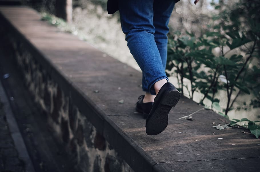 Person Walking on Footpath, action, black shoes, denim pants HD wallpaper