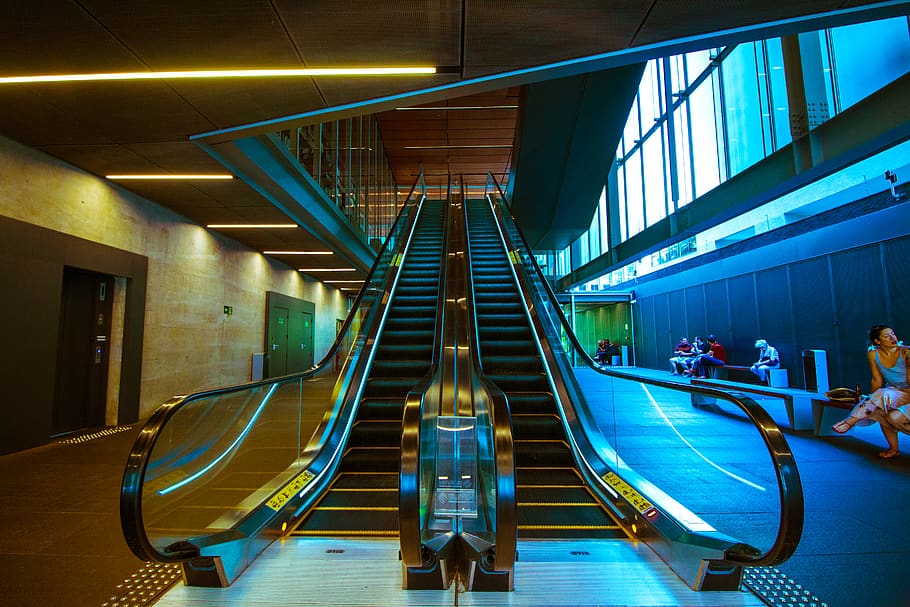 Escalators Inside Building, architecture, blue, colors, commerce HD wallpaper