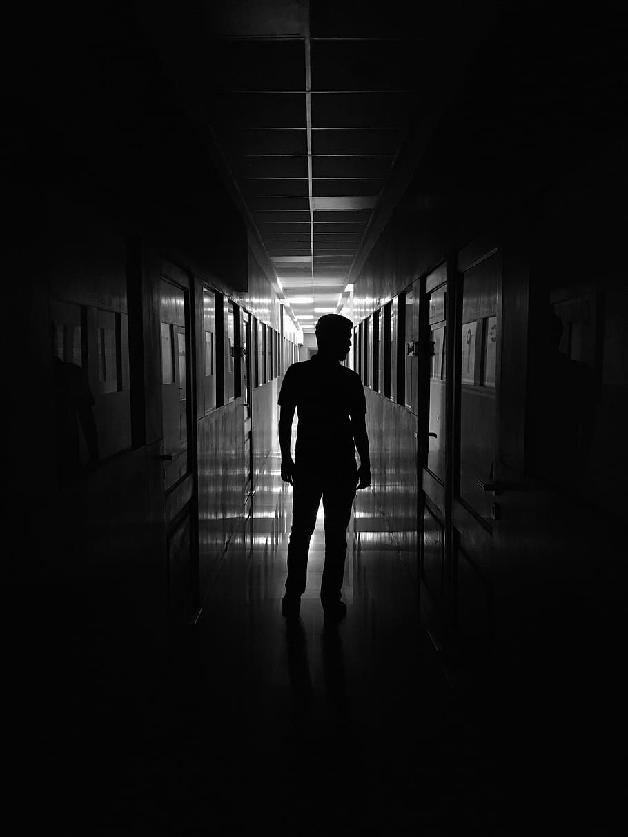 man standing in between rooms, corridor, human, person, flooring