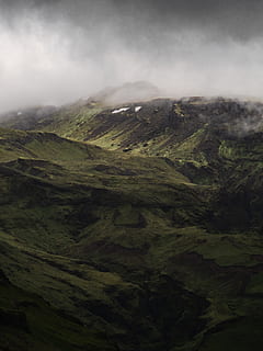 aerial photography of green mountain under cloudy sky, moody HD wallpaper