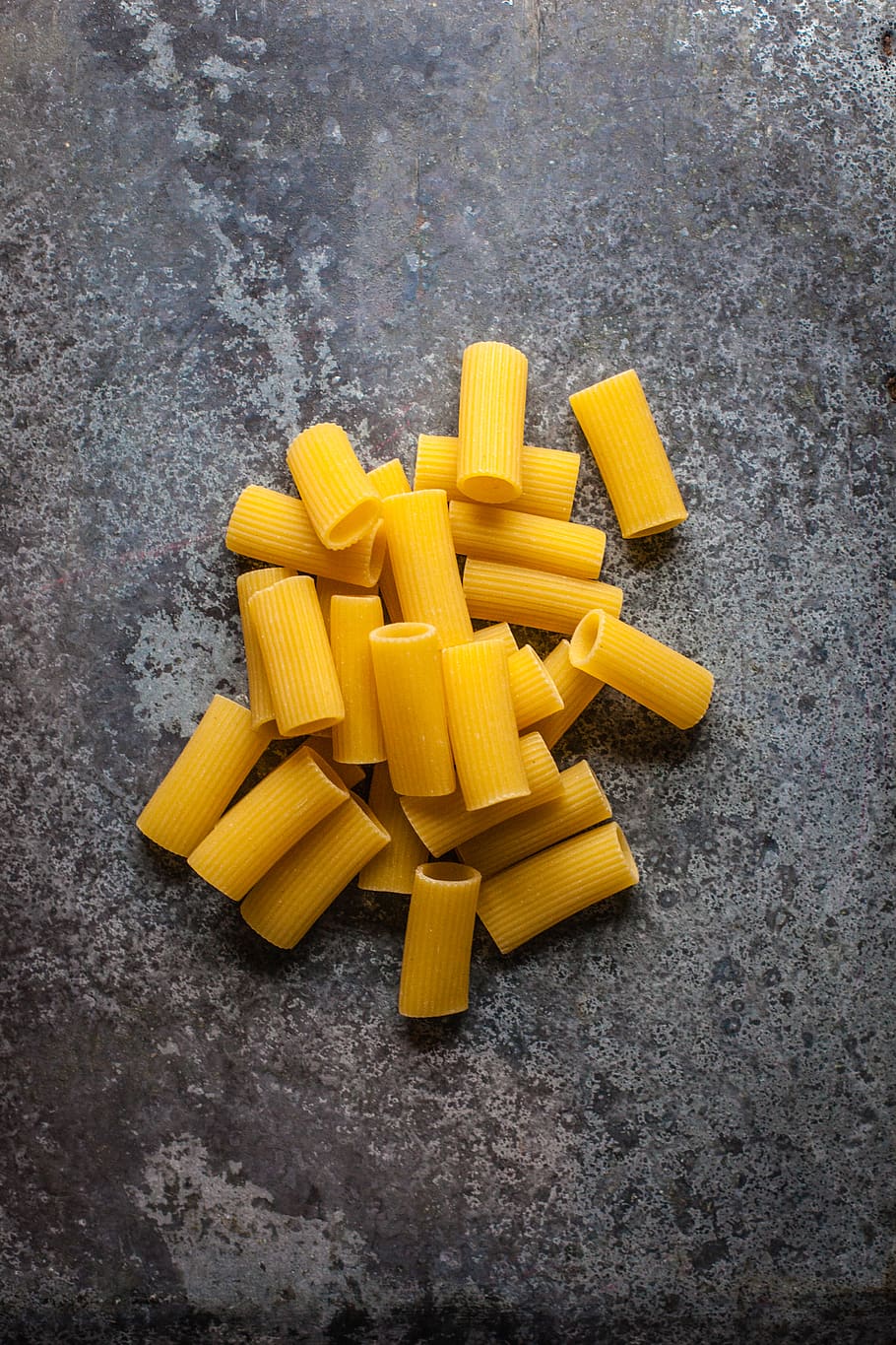 yellow pasta on gray surface, italian food, food and drink, large group of objects HD wallpaper