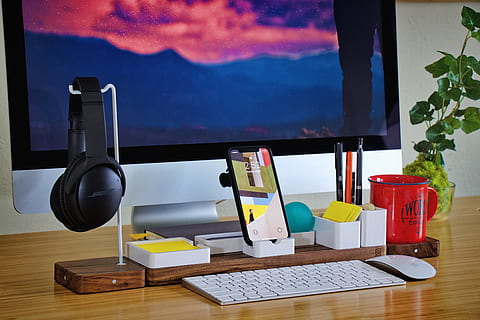 smartphone beside black headphones and red ceramic mug, workspace HD wallpaper