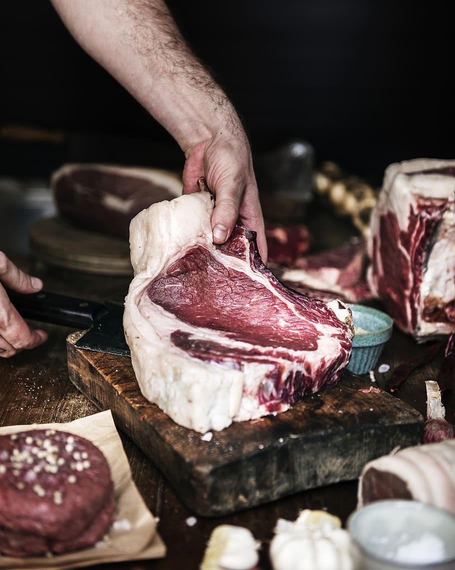 Photo Of Person Holding Raw Meat, blood, blur, butcher, butchery