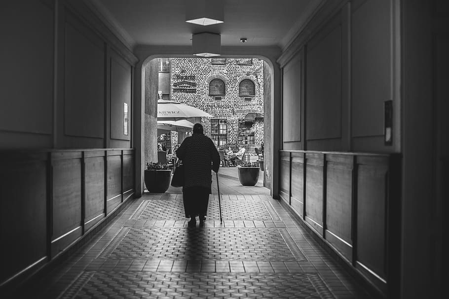 old lady, darkness, light, garden, old building, street, real people HD wallpaper