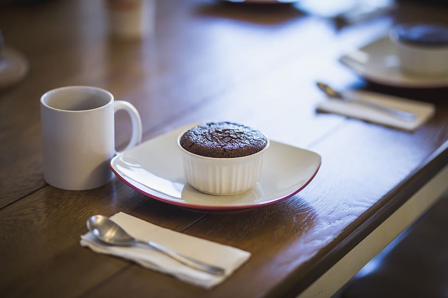 cupcake in ramekin beside mug, food, dessert, creme, cream, icing HD wallpaper