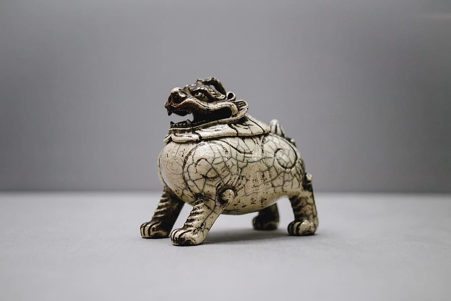 gray ceramic foo-dog figurine on white surface, animal themes HD wallpaper
