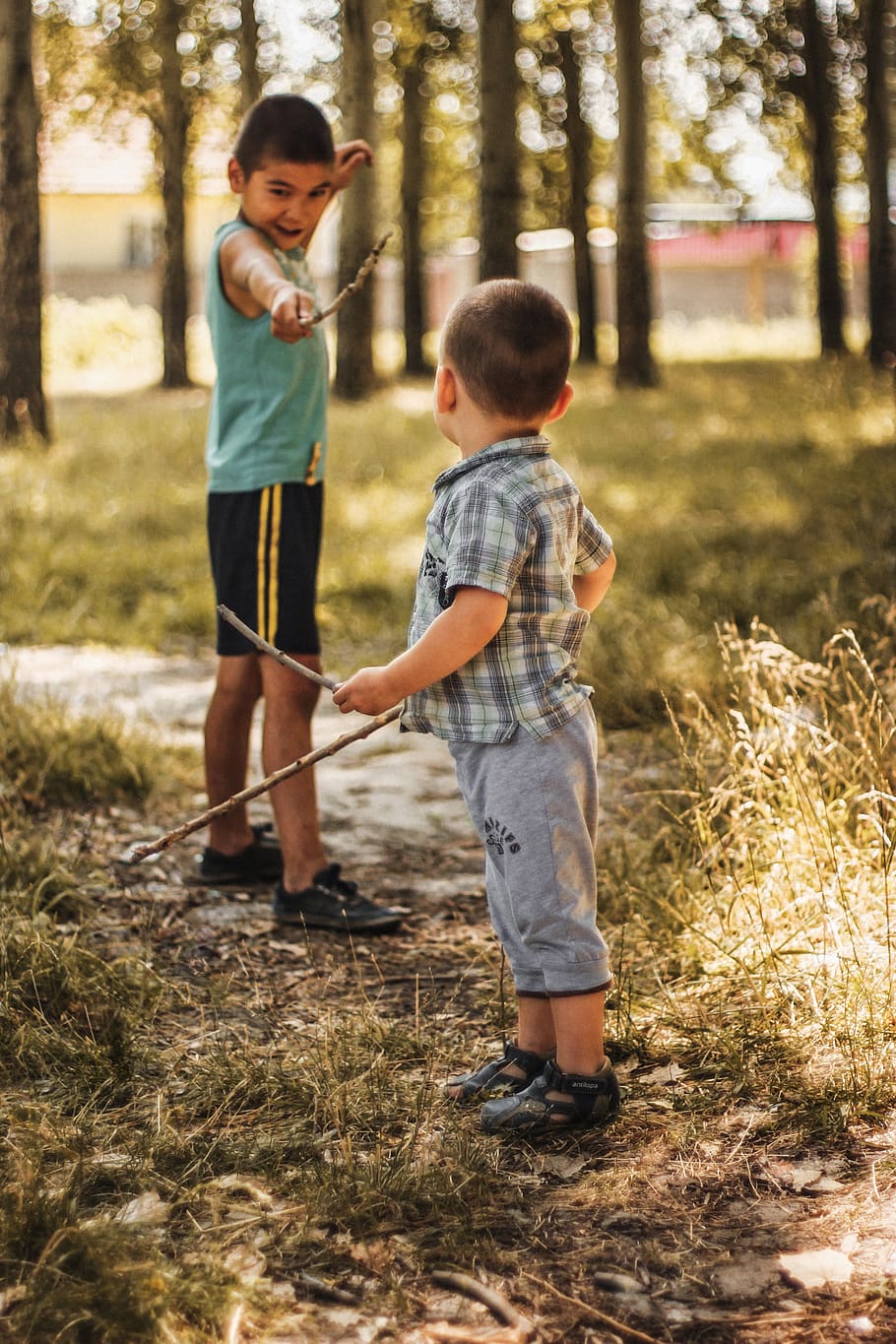 two boys playing sticks, person, human, people, bishkek, kyrgyzstan HD wallpaper