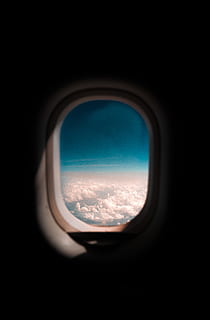 white clouds, window, porthole, shutter, curtain, light, flare HD wallpaper