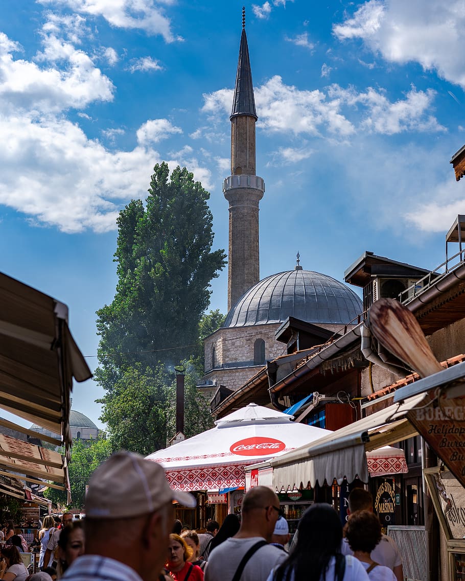crowd surrounded by stores near brown tower, mosque, street, busy HD wallpaper