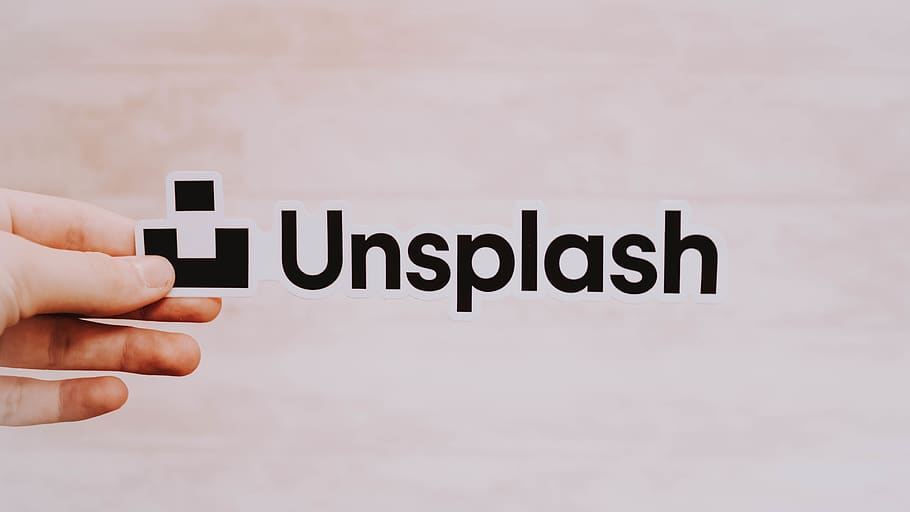 Unsplash logo, human, person, hand, finger, face, text, gesture HD wallpaper