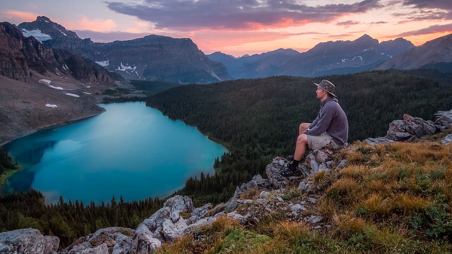 man looking on mountain sitting on rock, scenics - nature, beauty in nature HD wallpaper