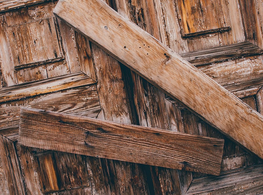 Selective Photo of Two Brown Wood Lumbers barring a door, architecture HD wallpaper