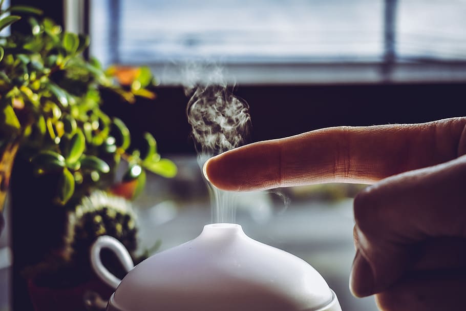 Person Putting Finger on Mist, close-up, color, diffuser, hand HD wallpaper