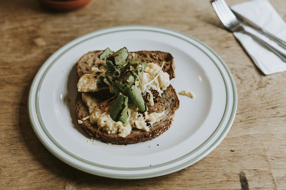 Plate with a Slice of Brown Bread With Herbs and Cheese, appetizing HD wallpaper