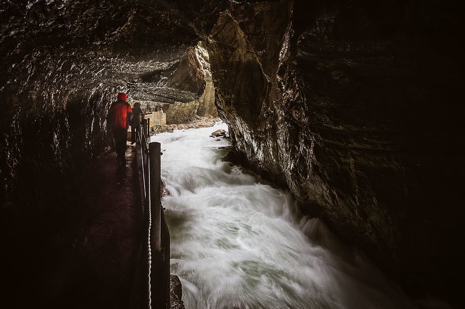 person standing on cave with eiver, river, water, gorge, flow HD wallpaper