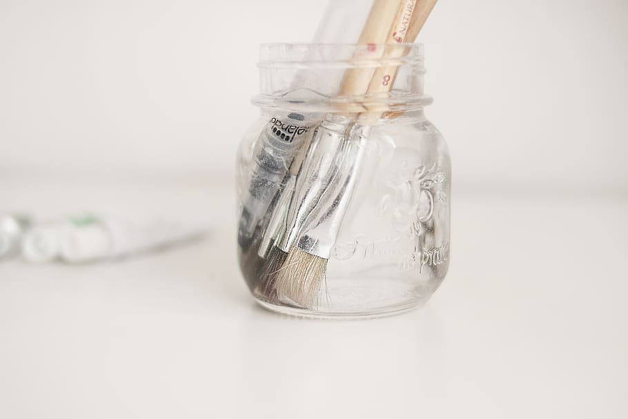Close-Up Photo of Paintbrushes In Bottle, blur, container, depth of field HD wallpaper
