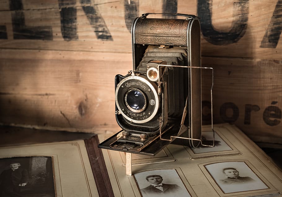 Vintage Black Camera on Brown Surface, antique, classic, lens