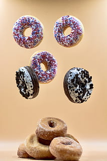 assorted doughnuts, donut, cake, levitation, floating, sprinkles HD wallpaper