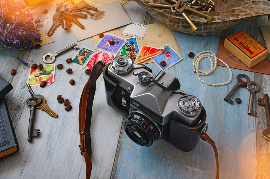 Black Dslr Camera, background, beads, close-up, equipment, flowers HD wallpaper