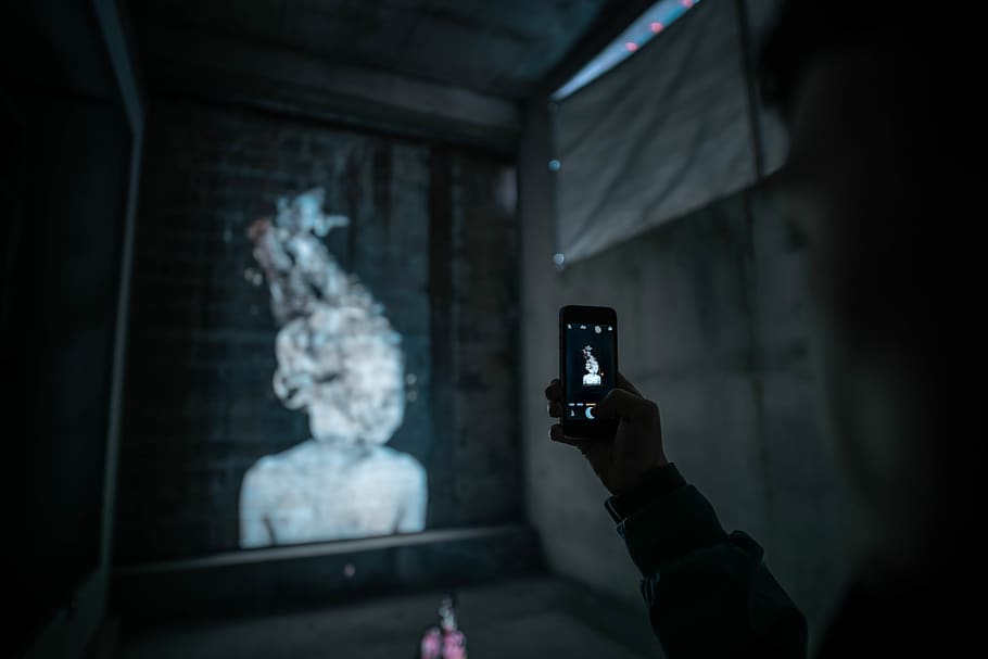 Person Using Smartphone While Taking Photo, artwork, iphone, low light HD wallpaper