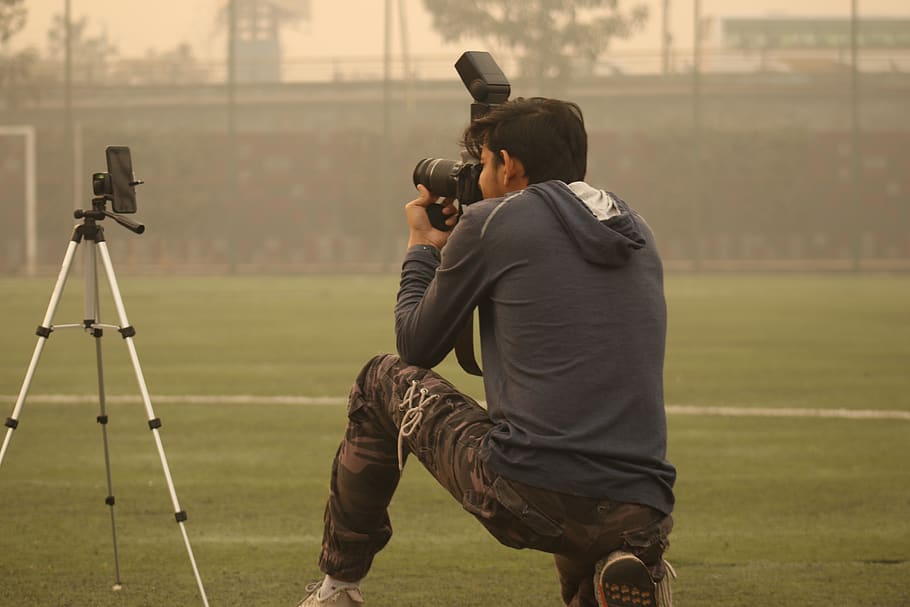 man taking photo, person, human, india, mumbai, football turf, HD wallpaper