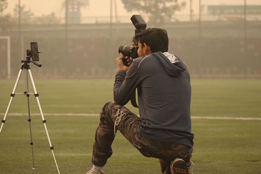 man taking photo, person, human, india, mumbai, football turf HD wallpaper